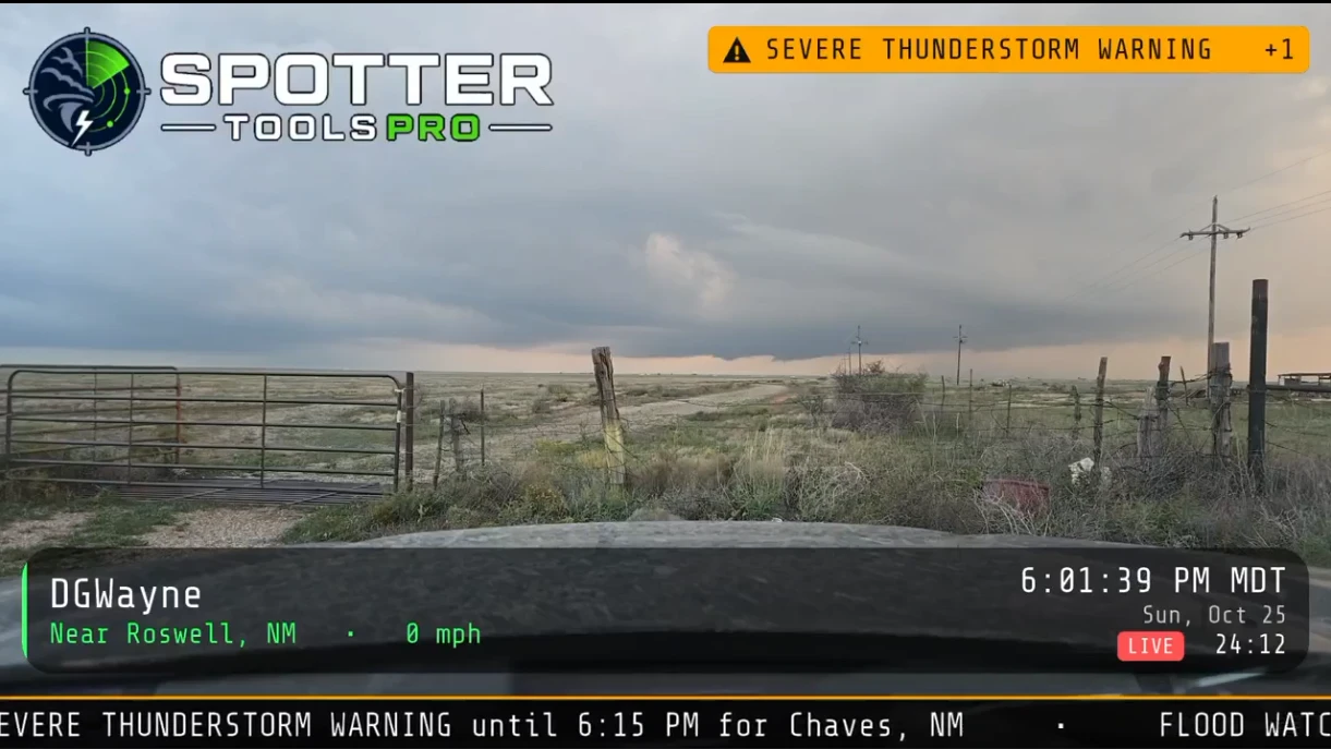 Live stream from a dashboard: a severe thunderstorm warning badge, the streamer's name, nearest town, speed, clock, time on air and a scrolling alert ticker